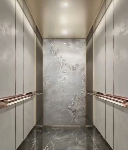 SCHNEIDER cabin with silver marble rear panel and copper handrails