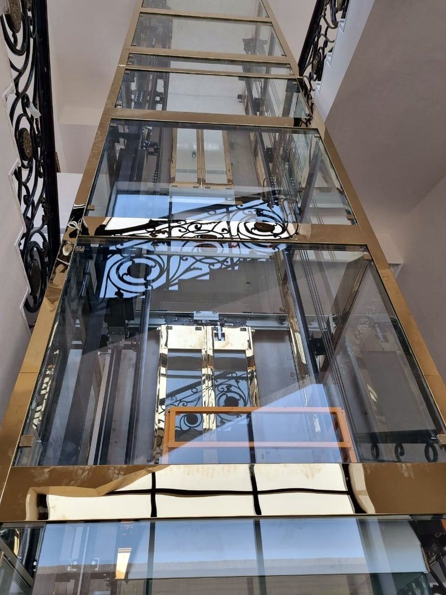 Panoramic lift with brushed gold frame
